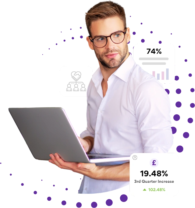 Young man wearing glasses holding a laptop